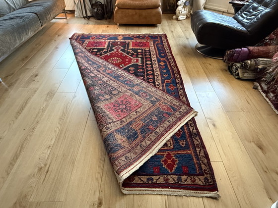 Image 1 of Vintage hand-knotted rug with geometric power | 254 × 155 cm