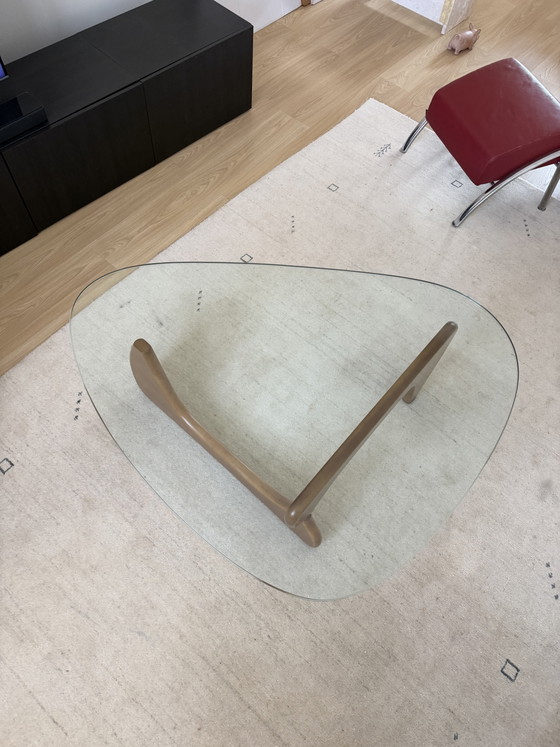 Image 1 of Glazen salontafel met houten voet