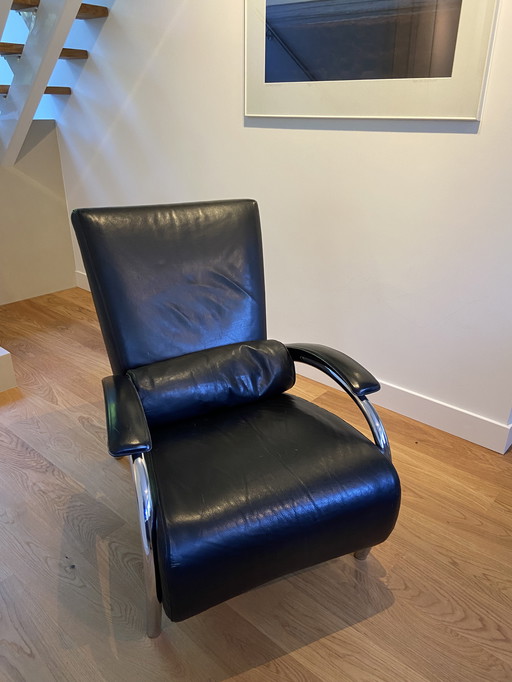 Molinari black leather armchair with roll cushion
