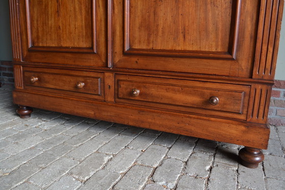 Image 1 of Sleek antique mahogany cabinet.