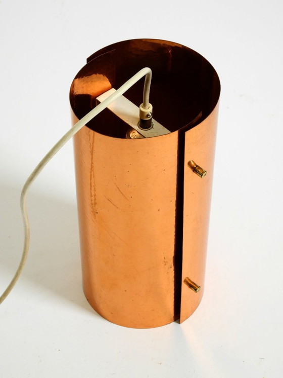 Image 1 of Two rare mid-century tube pendant lamps consisting of two screwed-together copper bowls