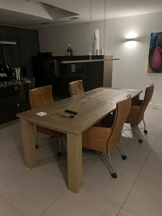Image 1 of Solid oak table, dimensions 225cm long and 95cm wide, with a protective coating on the top. Ideal for a family.