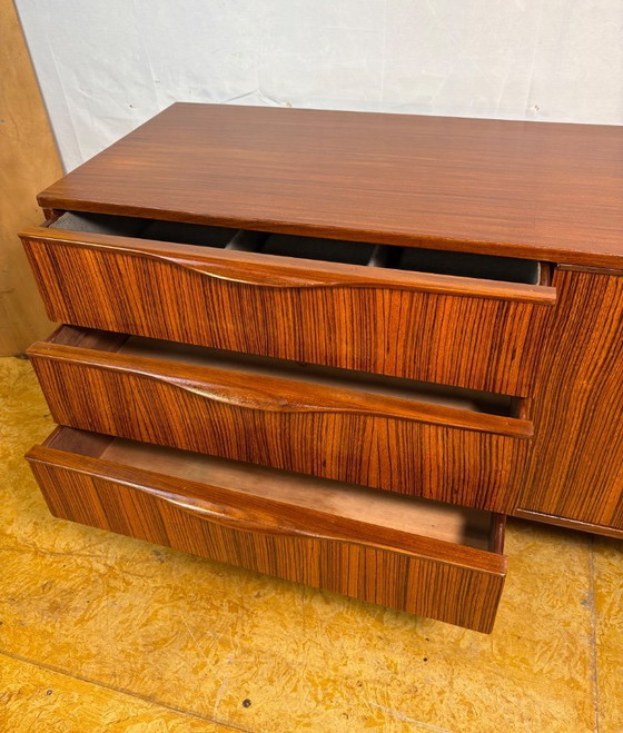 Image 1 of Mid Century Retro Teak Sideboard by Elliotts of Newbury Circa 1960  A stunning mid century modern sideboard