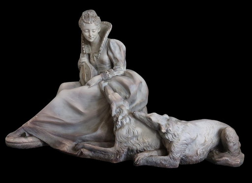Sculpture Art Déco d'une dame assise avec des chiens