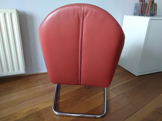 Image 1 of Red leather armchair by Wittmann.