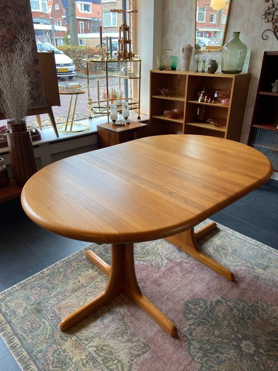 Image 1 of Vintage Danish extendable dining table made of solid teak wood