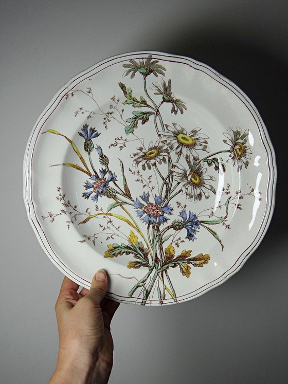 Image 1 of Antique Longchamp deep dish with polychrome ironstone daisies