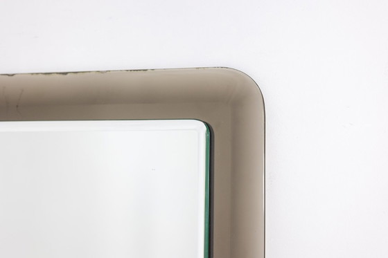 Image 1 of Two-tone rectangular mirror with rounded corners. Circa 1950