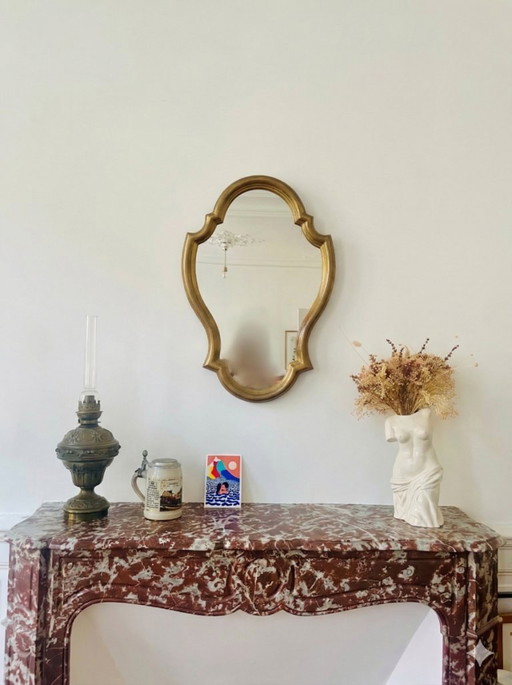 Miroir baroque en bois doré