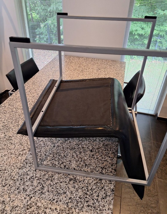 Image 1 of Zwart lederen Arco Frame eetkamerstoelen