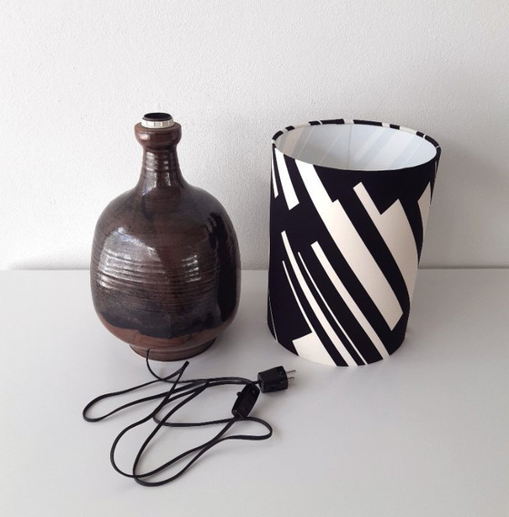 Image 1 of Sturdy dark brown ceramic Rheinfelden lamp base with new handmade lampshade of black and white graphic fabric