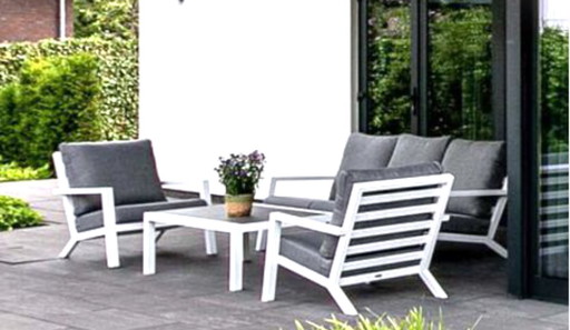 Conjunto de salón de jardín blanco: sofá, mesa y 2 tumbonas.