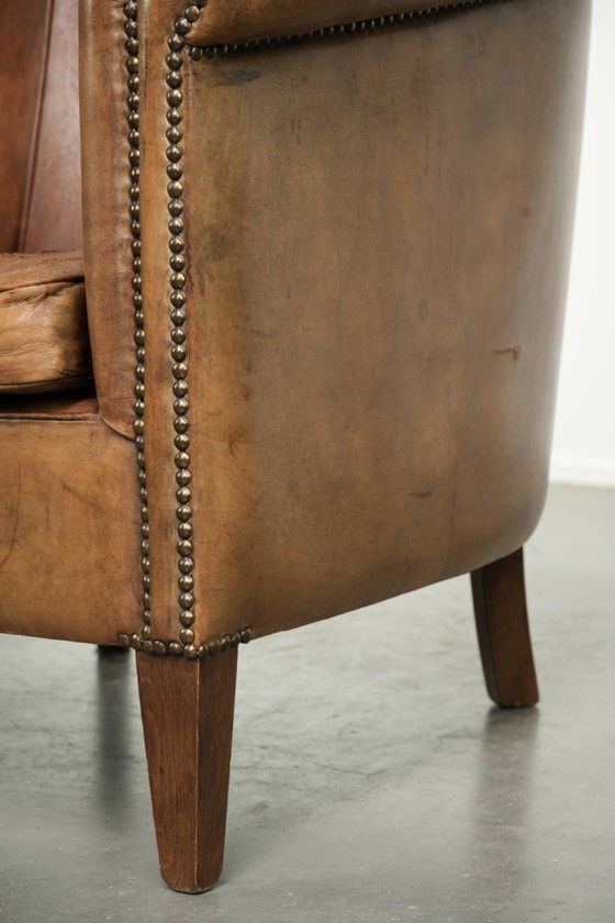 Sturdy Worn Vintage Sheepskin Club Armchair With A Comfortable Seat And A Beautiful Color – Leather (photo 13 of 13)