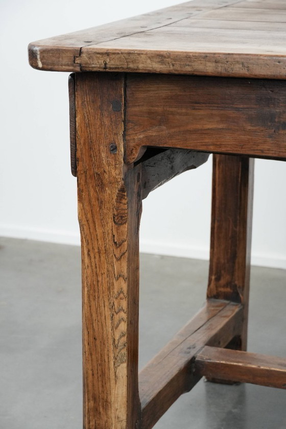 Image 1 of Robust antique French 6-person dining table made of fruit wood with 3 drawers from the late 18th century