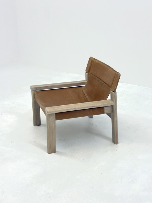 Fauteuil vintage en cuir de selle couleur cognac