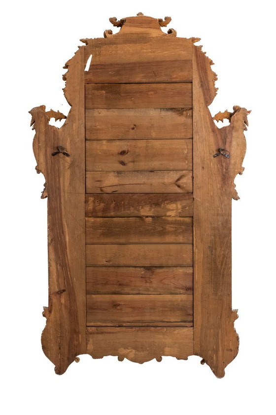 Image 1 of Mayfair. Grand miroir perlé en bois sculpté de style Régence. 20ème siècle.