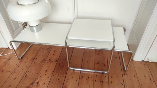 2 chrome tube design tables