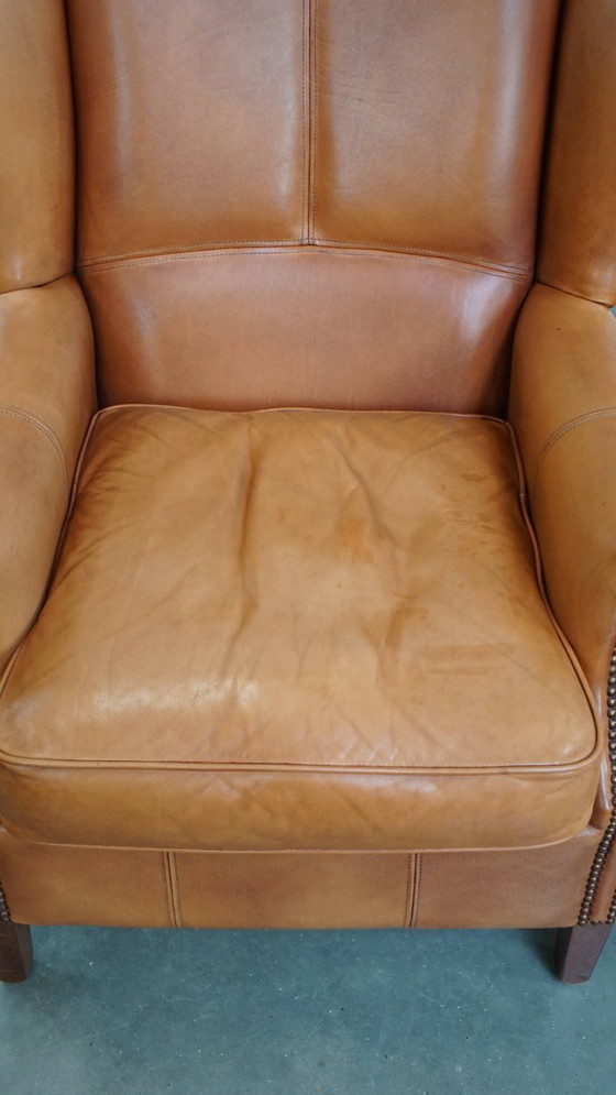 Image 1 of 2x Rundleren oorfauteuil afgewerkt met siernagels