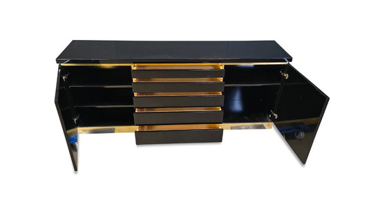 Image 1 of Dressoir van messing en lak, ontworpen door Jean Claude Mahey, jaren 70.