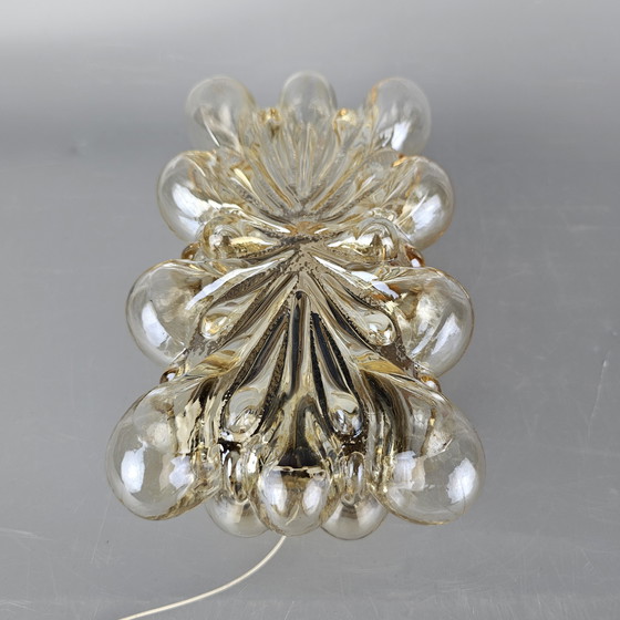 Image 1 of Vintage glass bubble wall lamp by Glashutte Limburg. Design by Helena Tynell. Glass and brass. 1960, Germany.