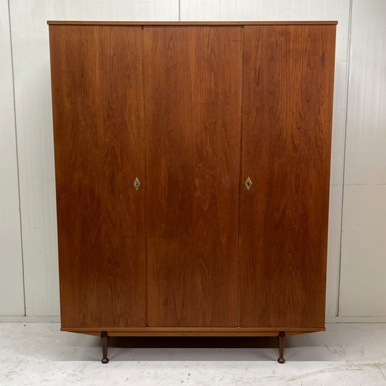 Sleek Danish vintage 3-door wardrobe with hanging and shelving – Wood (photo 2 of 12)