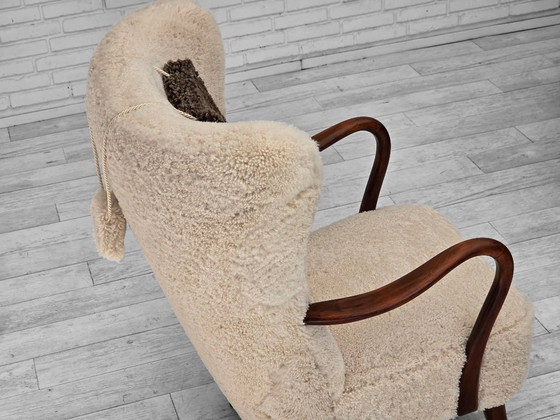 Image 1 of Jaren 60, Deens ontwerp van A. Christensen voor Slagelse Møbelværk, schapenvacht.