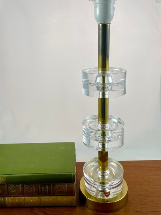 Image 1 of Carl Fagerlund for Orrefors – 6-Ring Crystal & Brass Table Lamp – Swedish Mid-Century Lighting