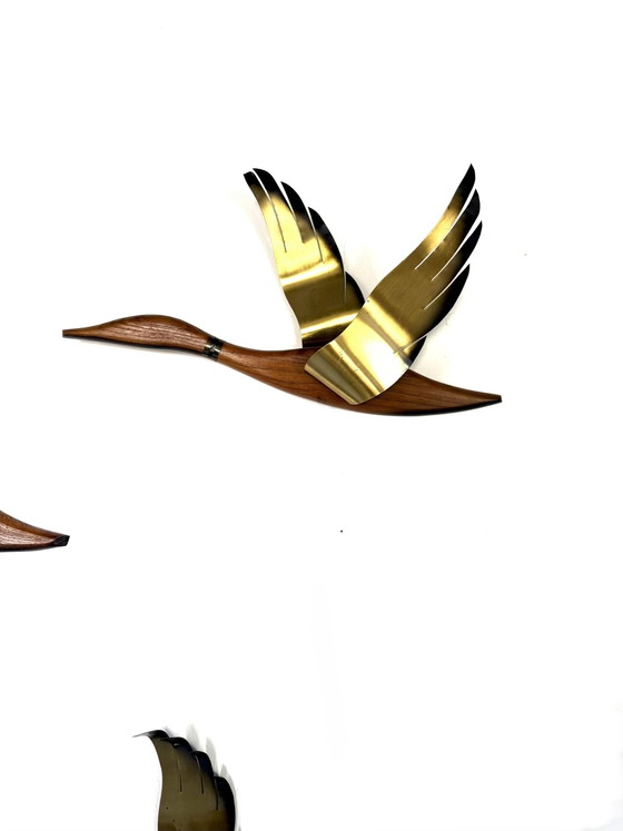 Image 1 of Vintage teak & messing vliegende eenden, jaren ‘60