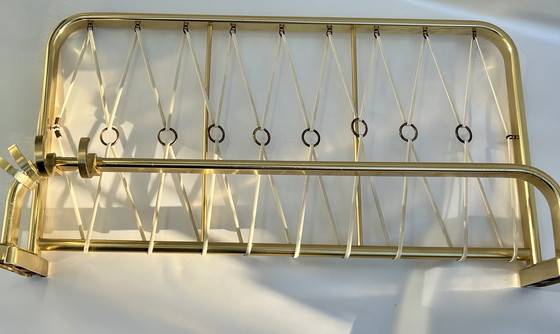 Image 1 of Revistero de pared de latón antiguo con bandas elásticas (alrededor de 1960)