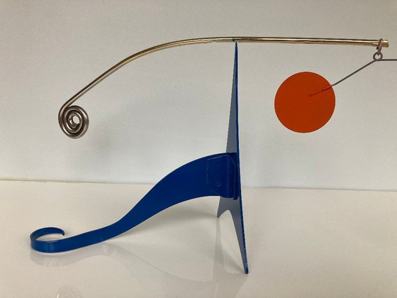 Image 1 of Blue curly stabilize