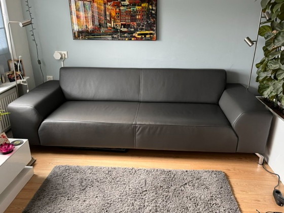 Image 1 of Bellissimo divano di design a 3 posti in pelle grigio/antracite + pouf abbinato.