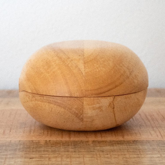 Image 1 of Light wooden box in the shape of an egg: modern design