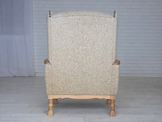 Image 1 of Deense fauteuil met hoge rugleuning uit de jaren 70, bekleed met meubelwol en gemaakt van massief eikenhout.