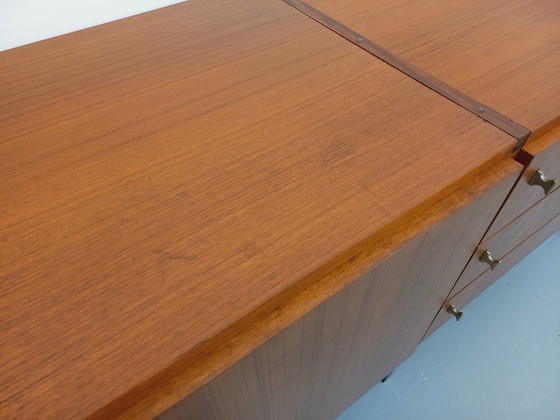 Image 1 of Vintage modernist sideboard by ARP Minvielle, designed by Guariche Mortier Motte, in teak and black metal, from the 1960s