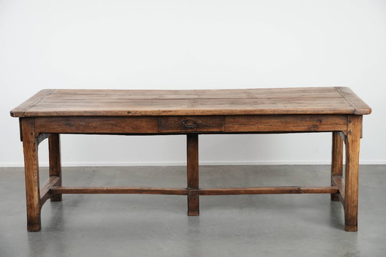 Image 1 of Robust antique French 6-person dining table made of fruit wood with 3 drawers from the late 18th century
