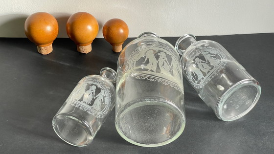 Image 1 of Vintage Engraved Glass and Wood Bottles