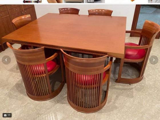 Image 1 of Frank Lloyd Wright Husser Dining Table with Six Barrel Chairs for Cassina in Cherry Wood and Red Leather