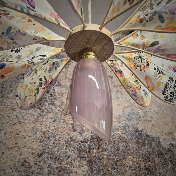 Image 1 of 12-petal propeller suspension in wicker and floral fabric with asymmetrical glass globe