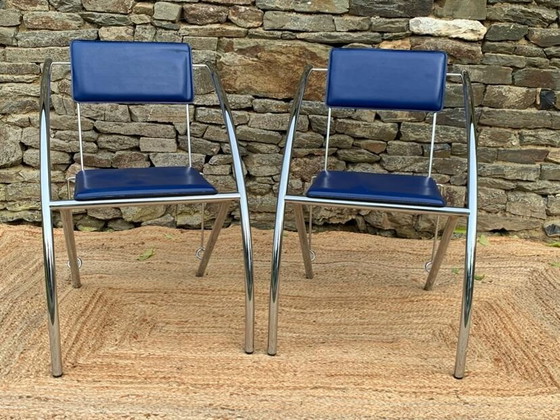 Image 1 of Set van 4 vintage stoelen in blauw imitatieleer en verchroomd metaal