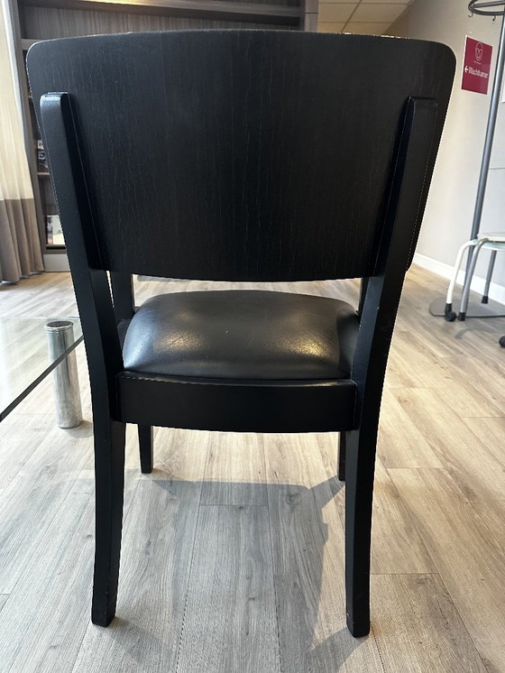 Image 1 of Bureaustoel  zwart hout leer (jaren 50-60)