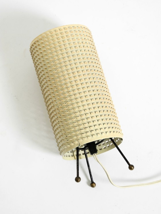 Image 1 of Original 1950s brass tripod table lamp with a perforated metal lampshade