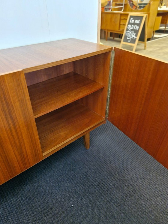 Image 1 of Vintage sideboard teak veneer wooden legs 70s