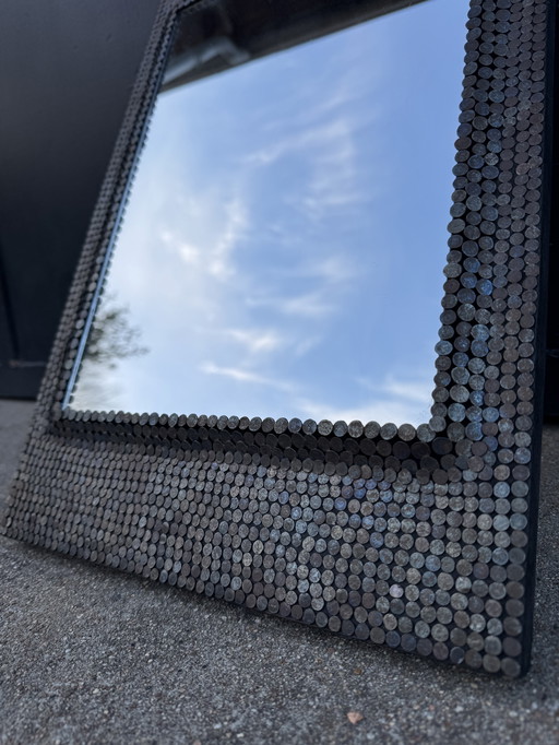 Brutalist style studded mirror from the 1950s
