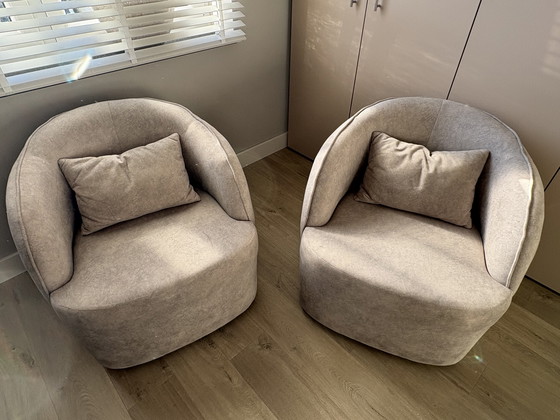 Image 1 of 2 luxurious swivel armchairs from Arma Interiors