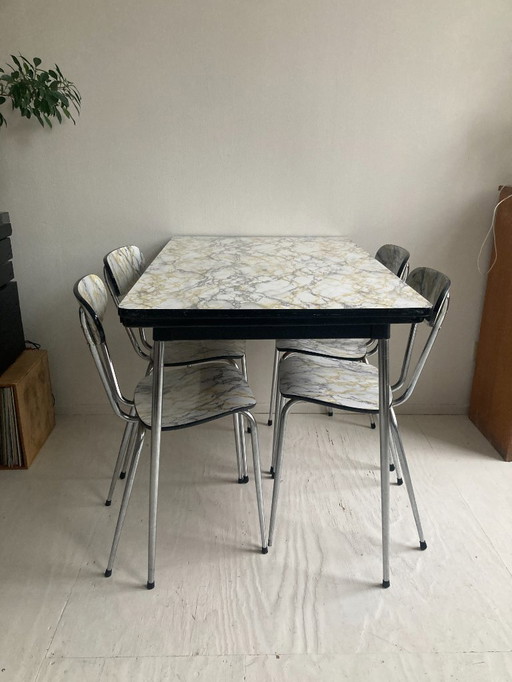 Extendable Formica table with four chairs