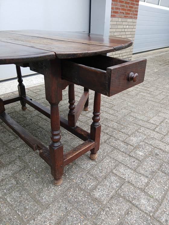 Image 1 of Antique English Gateleg Table from the 19th Century, Made of Solid Oak