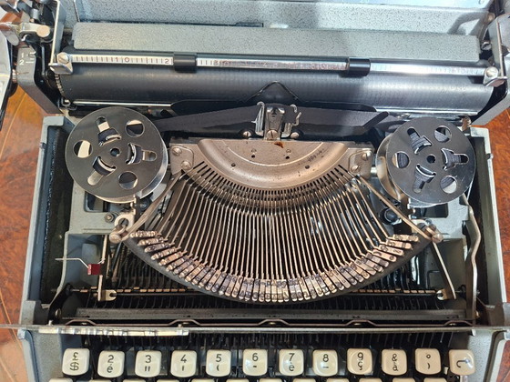 Image 1 of Remington Travel-Riter Deluxe (années 1960) + Documentation originale