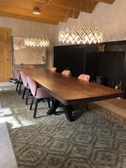 Sturdy solid oak table with 2 metal cross legs