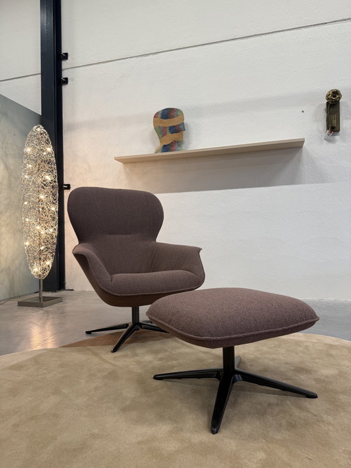 Poltrona girevole Pode Flare con poggiapiedi in tessuto