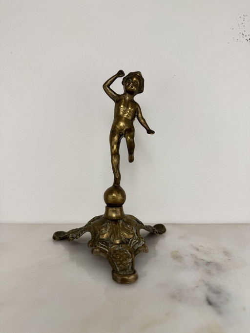 Antique bronze figurine of playing child - decorative and rare